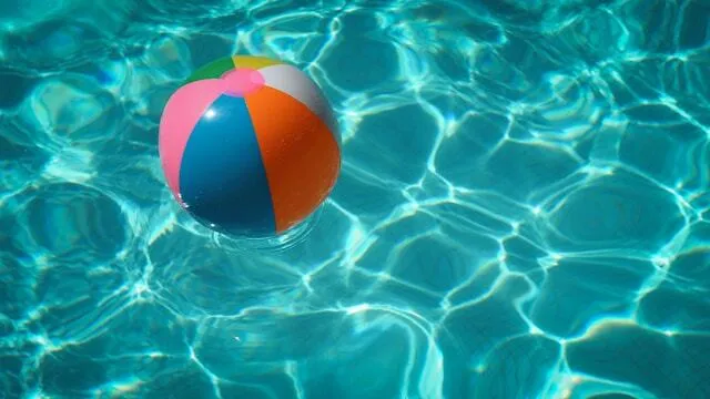 Beach ball floating in water